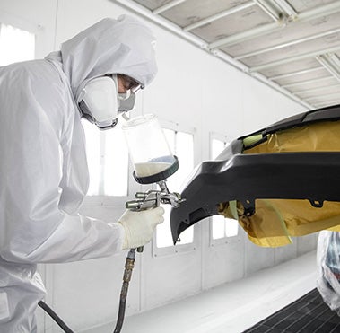 Collision Center Technician Painting a Vehicle | Younger Toyota in Hagerstown MD